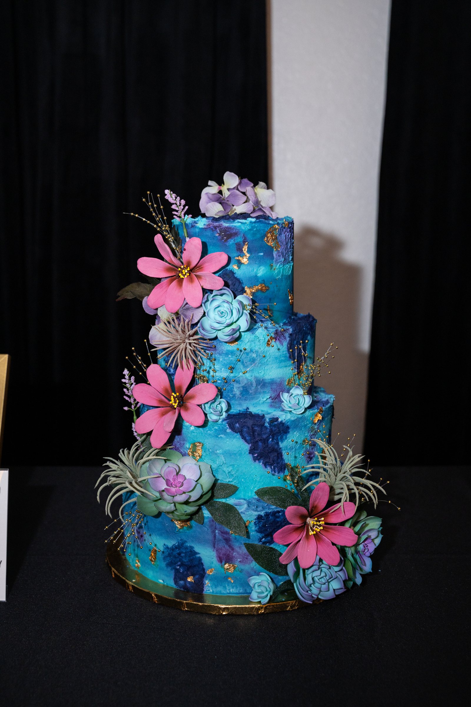 A hand-painted celebration cake at Trellis 925