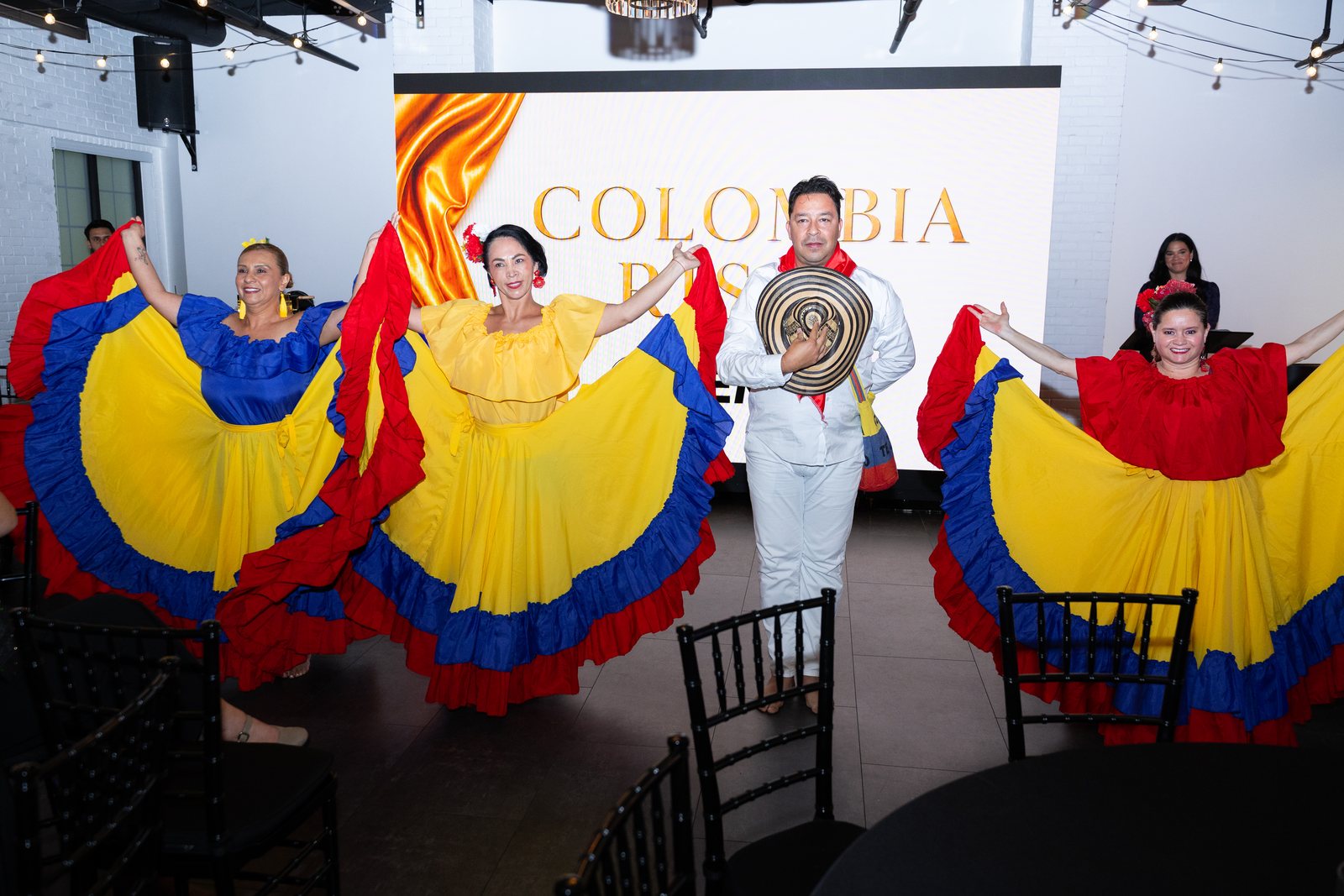 Folk dancers performing on stage at Trellis 925