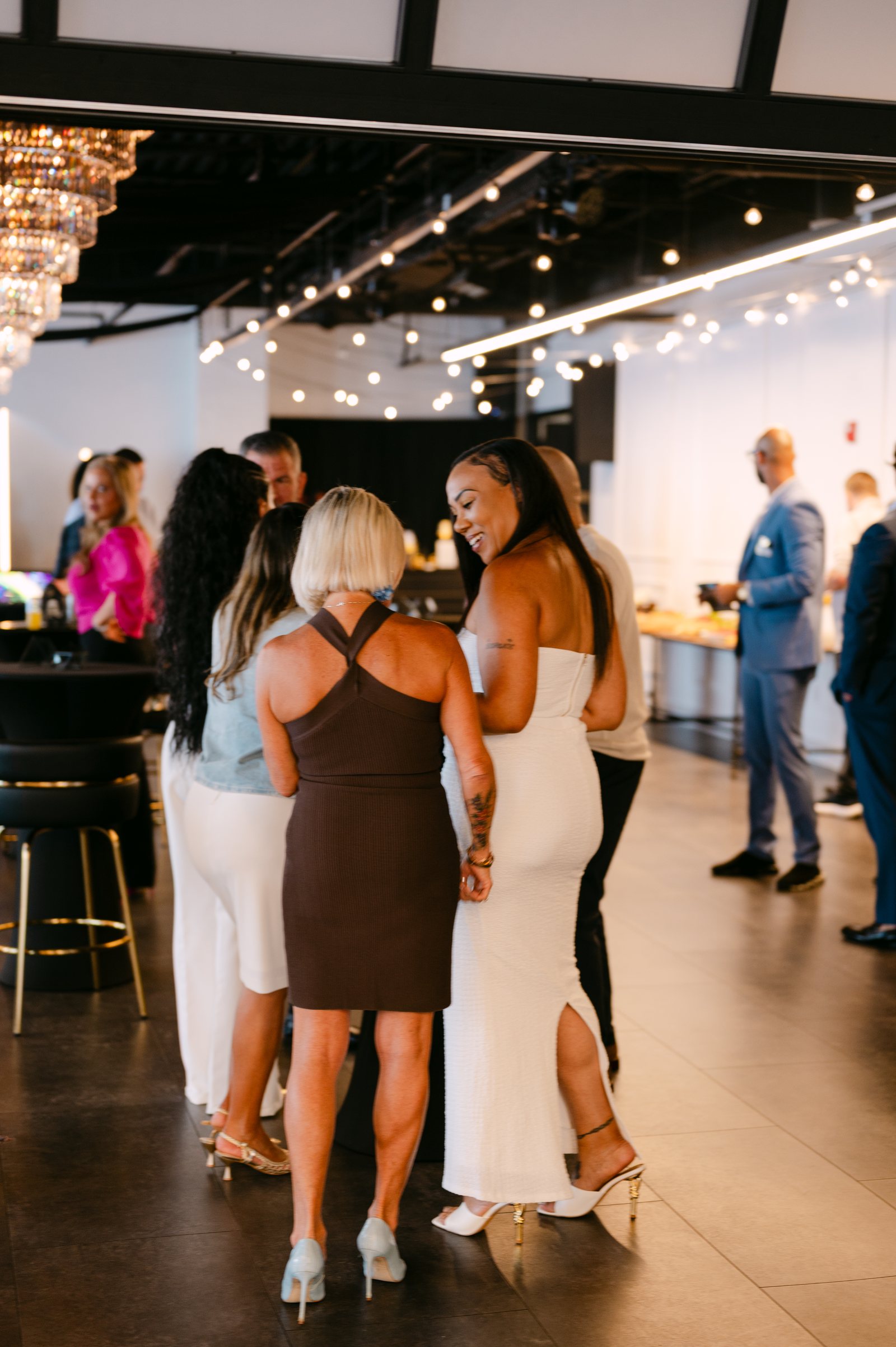 Attendees connecting at a corporate reception at Trellis 925