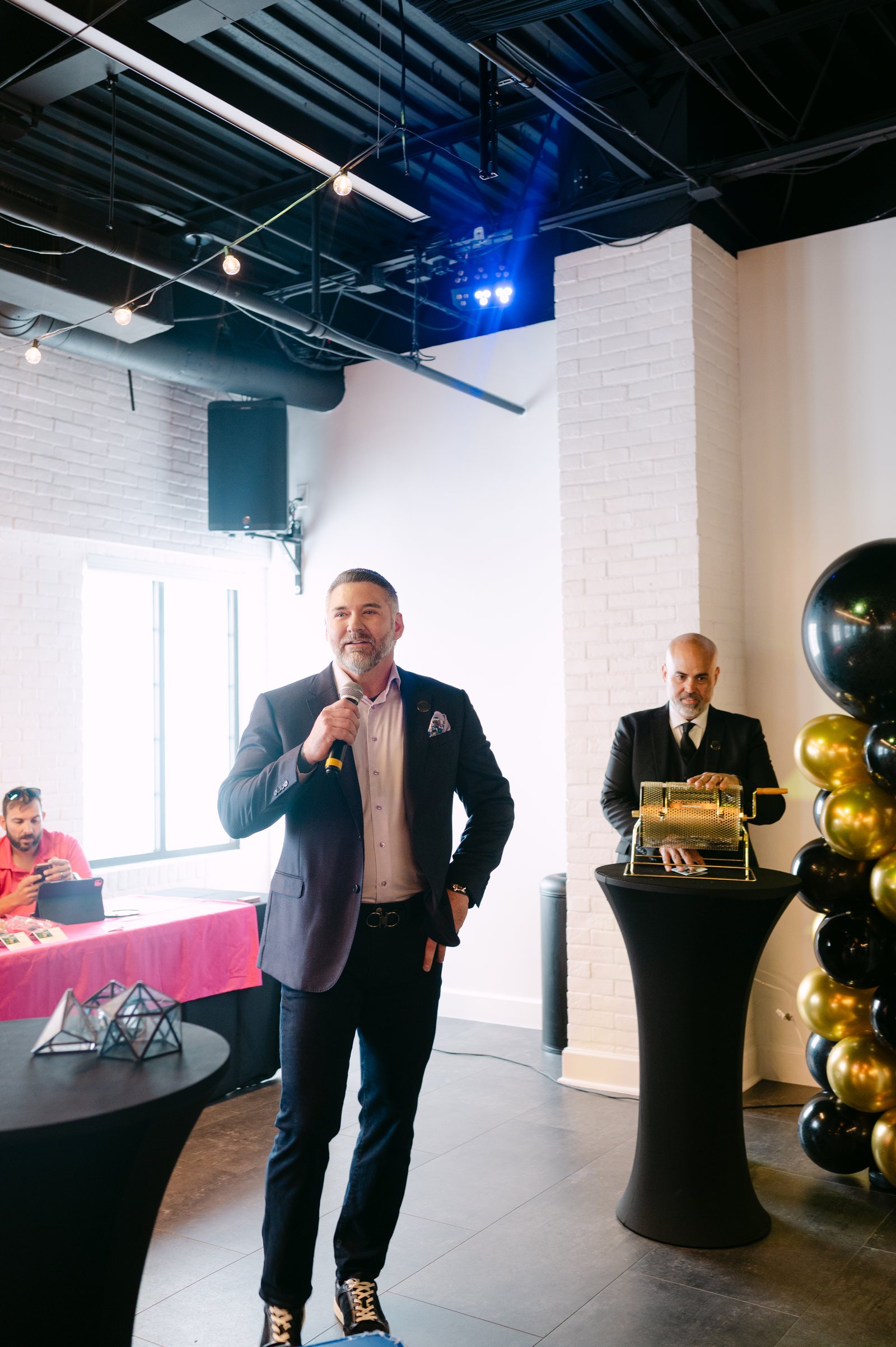 A speaker presenting to attendees at Trellis 925