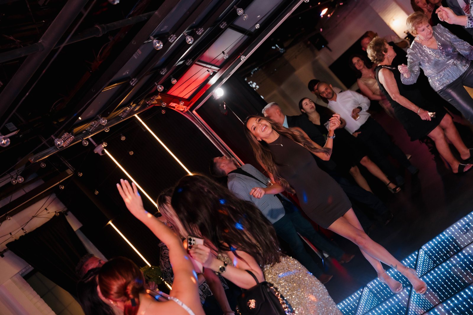 Guests dancing on the LED floor at Trellis 925