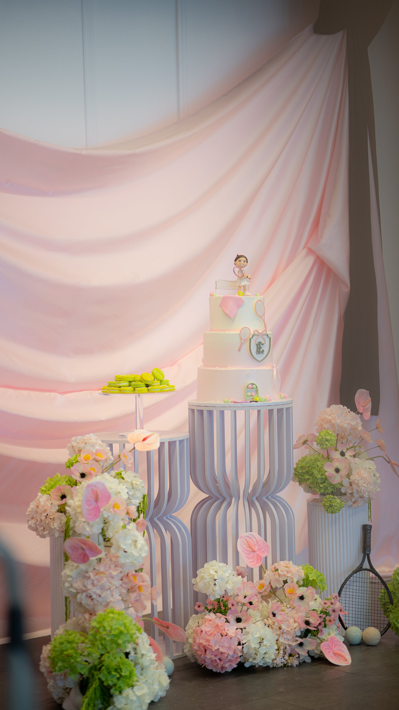 A cake and floral display at a private celebration at Trellis 925