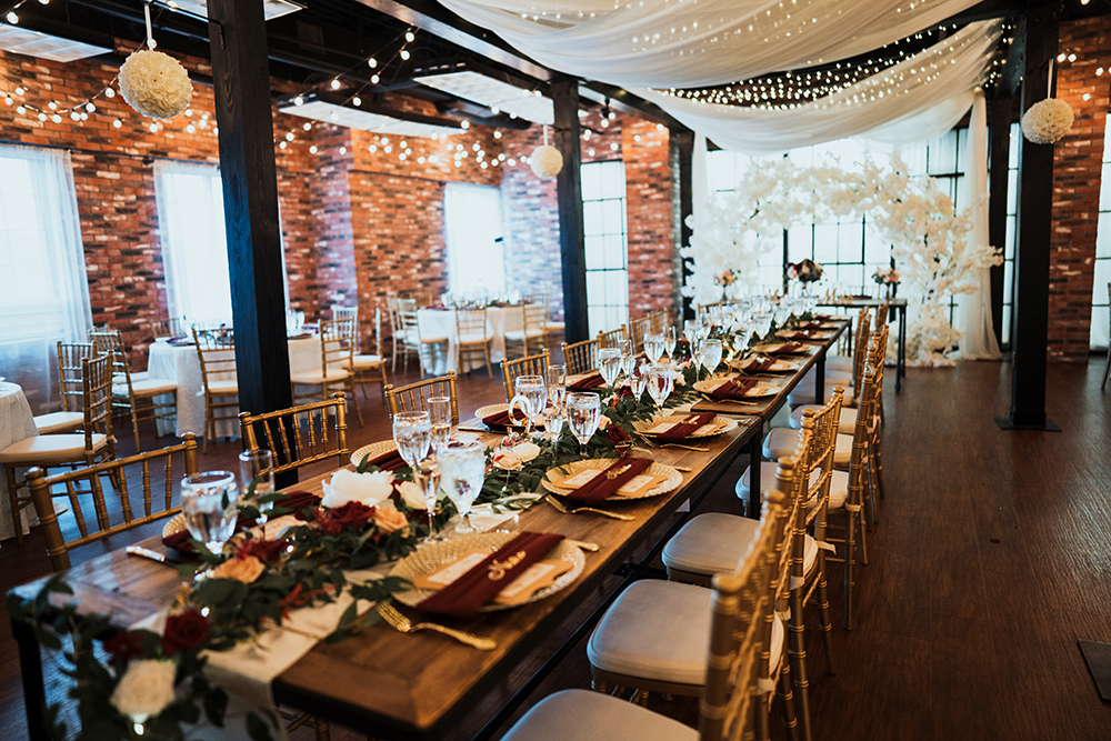 dinner set up wedding burgundy and white